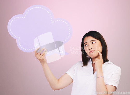 Image of Asian woman, speech bubble and thinking on mockup space in quote or doubt against a pink studio background. Female person in problem solving with shape, icon or symbol in brainstorming or decision