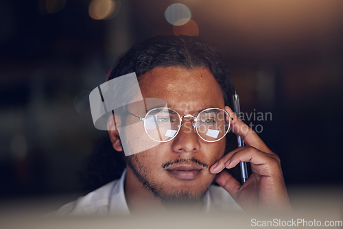 Image of Business man, thinking and focus on computer for information technology, software development and solution. Professional worker reading with glasses for IT decision, programming or planning at night