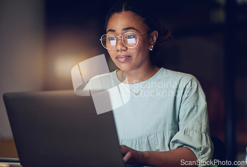 Image of Laptop, typing and night woman reading public relations story, social media blog and customer experience report. Dark room, analysis and professional person check online article, project of feedback