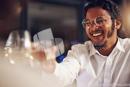 Image of Celebration, happy man and friends toast alcohol for achievement, congratulations party and celebrate New year event. Night group cheers with champagne, wine or drinks glass at fine dining restaurant