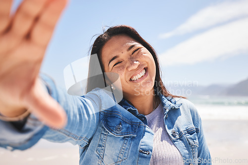 Image of Happy, selfie and woman on beach for holiday, vacation or summer in Indonesia or profile picture for social media or memory. Portrait, smile and person at the ocean, sea or relax in nature for break