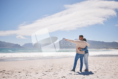 Image of Love, hug and space with couple at beach for travel, summer vacation and romance together. Happy, relax and holiday with man and woman walking on seaside holiday for care, date and honeymoon mockup