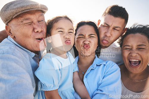 Image of Funny, selfie and child with grandparents and parents in nature on a vacation, adventure or holiday. Comic, goofy and family generations taking a picture with silly faces by a sky on a weekend trip.