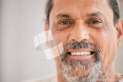 Image of Happy, smile and portrait of a mature man with confidence and positive attitude by mockup space. Calm, headshot and closeup face of a male person from Mexico with pride by mockup for marketing.
