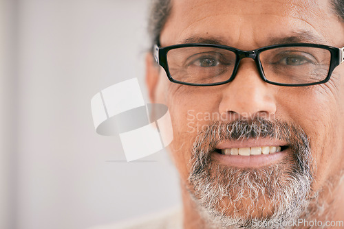 Image of Portrait, smile and glasses for vision with a man on mockup space for an optometry appointment. Face, mockup and eyewear frame with a mature male customer at the optician for an eye test or exam