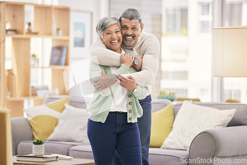 Image of Portrait, hug and senior couple with a smile, home and love with marriage, bonding and retirement. Lounge, old man and mature woman embrace, affection and loving together with relationship and peace