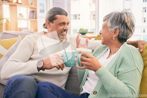 Image of Coffee, conversation and mature couple on sofa for bonding, healthy relationship and connection. Marriage, love and happy man and woman drinking tea on couch to relax in discussion, talking and chat