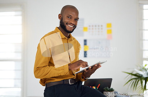Image of Portrait of black man at desk with smile, tablet and research for business website, online report and social media. Internet, digital app and businessman in office with web schedule and confidence.
