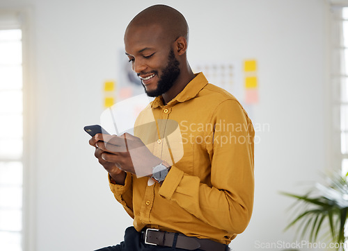 Image of Business, black man and typing on smartphone in office for social network, mobile website and internet contact. Happy worker scroll on cellphone chat, reading news app and notification of information