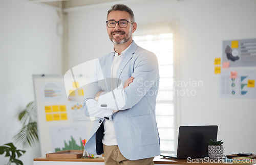 Image of Entrepreneur, mature man and portrait with arms crossed in London, office or workplace for planning a project in startup. Happy, employee and face of businessman working or confidence of business ceo