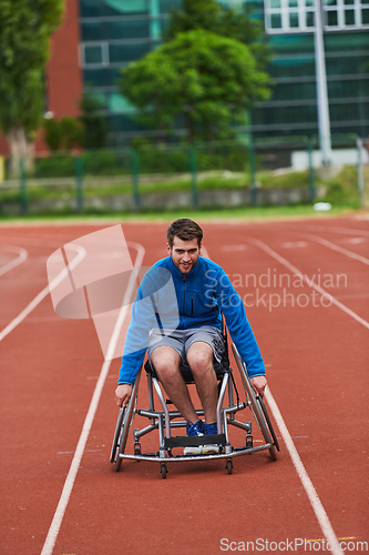 Image of A person with disability in a wheelchair training tirelessly on the track in preparation for the Paralympic Games