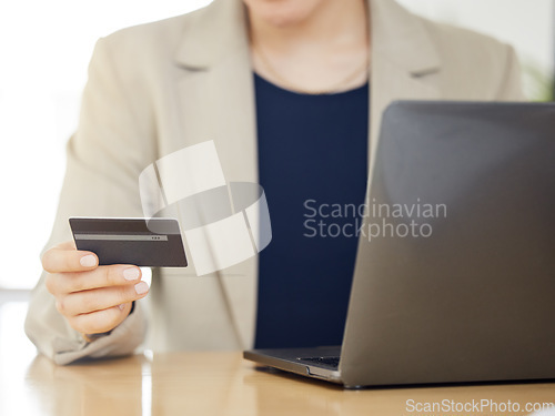 Image of Online shopping, credit card and business woman with payment on a internet or banking on a laptop. Hands, loan and corporate professional or customer use rewards to purchase on ecommerce website