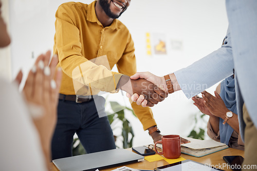 Image of Creative people, handshake and meeting in hiring, b2b or partnership and applause in teamwork at office. Happy employees shaking hands in team recruiting, agreement or deal in startup at workplace