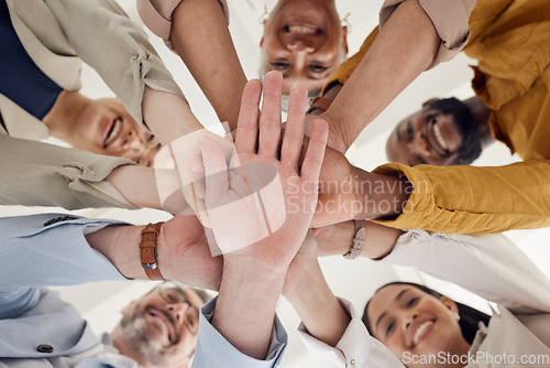 Image of Hands, stack and team building, business people and support with winning, planning and mission, low angle and trust. Corporate community, success and solidarity, collaboration and palm with synergy