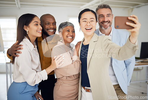 Image of Happy selfie, group and business people in office for support, trust and global team building. Diversity, employees and friends smile in collaboration for photography, social media and startup blog