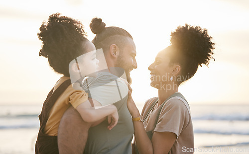 Image of Love, family and smile at beach at sunset, bonding and having fun together. Happy, mother and father of child at ocean in interracial care on summer holiday, vacation trip and travel outdoor at sea