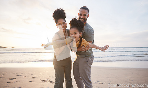 Image of Family, portrait and beach for airplane, travel and freedom, bond and fun in nature together. Love, flying and happy girl child with parents at the ocean playing, relax and smile on summer holiday