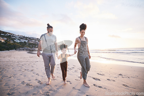 Image of Family, holding hands and walking on beach at sunset, bonding and mockup space. Father, mother and happy kid at ocean in interracial care, love or smile on vacation, holiday or summer travel together