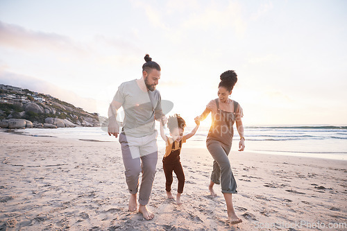 Image of Family, holding hands and beach for travel, vacation and freedom, bond and fun in nature together. Love, swing and girl child with parents at the ocean playing, relax and walking on summer holiday