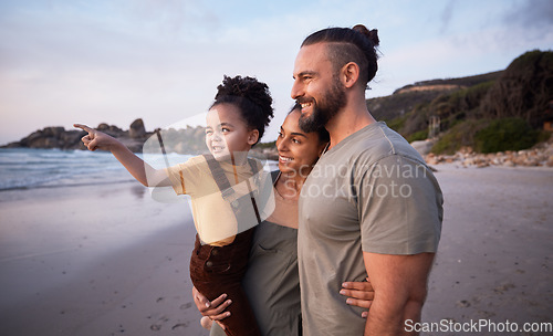 Image of Child, pointing and happy family on beach at sunset on summer, vacation or bonding together on tropical holiday in Costa Rica. Ocean, view and interracial parents support girl or kid show with hand