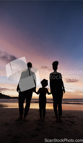 Image of Silhouette, family at beach and holding hands at sunset, bonding or outdoor on mockup space. Shadow, sea and father, kid and mother at ocean in care, summer holiday or vacation to travel together