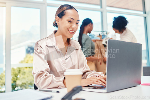 Image of Business woman, fashion designer and computer planning, online shop management and website or blog in office startup. Creative worker on laptop with clothes marketing, e commerce or project research