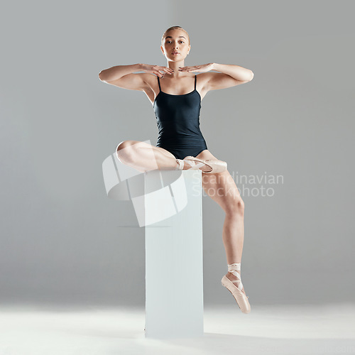 Image of Balance, ballet or portrait of woman in studio on platform in elegant performance or creative freedom. Art, dancer or girl ballerina ready to start dancing or training to exercise on white background
