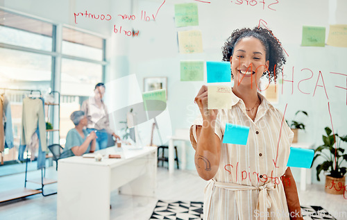 Image of Creative woman, fashion designer and writing strategy in schedule planning or idea on glass board at the office. Female person in retail startup, project plan or brainstorming tasks at the workplace