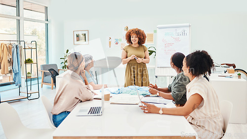 Image of Creative woman, fashion design and coaching in meeting, presentation or planning at the office. Female person, mentor or manager in team discussion, retail startup or clothing project at workplace