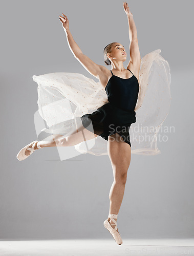 Image of Ballet, woman or dancer with pose, training or performance on white studio background. Female performer, ballerina or artist with technique, stretch for a show or elegant art with creative or fitness