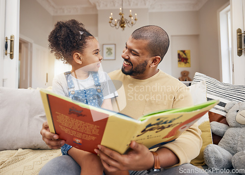 Image of Man, child and book on sofa with smile, bonding and love in storytelling in living room together. Happiness, father and daughter reading story on couch for fantasy, learning and education in home fun