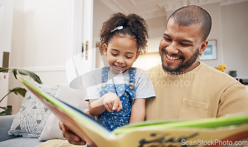 Image of Dad, daughter and book on sofa together, bonding and love in storytelling in living room with smile. Happiness, father and child reading story on couch for fantasy, learning and education in home fun