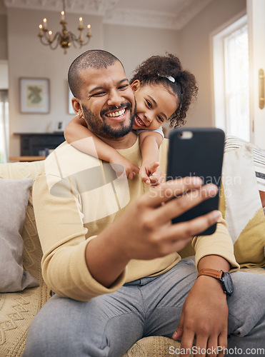 Image of Home, father and girl with a smile, selfie and social media with connection, family and loving together. People, parent and female child on a couch, profile picture and memory with happiness and love