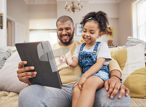 Image of Happy, pointing and a child with a father and tablet for a cartoon, movie and streaming games. Smile, family and a dad with a girl kid and gesture to technology for a show or social media in a house