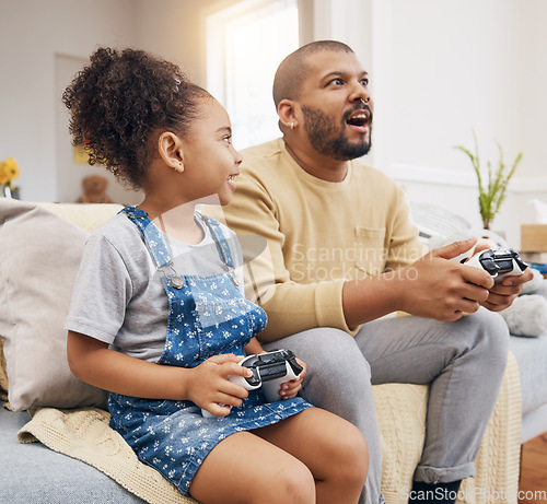 Image of Father, daughter and gaming controller on sofa with challenge, press and competition for bonding in house. Man, girl child and playful with esports, contest and strategy with thinking in family home