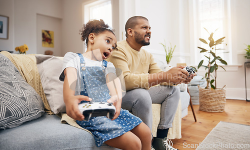 Image of Dad, girl and video game controller on sofa with challenge, shout and wow in competition, bonding and house. Man, daughter and excited with esports, contest and funny with strategy in family home