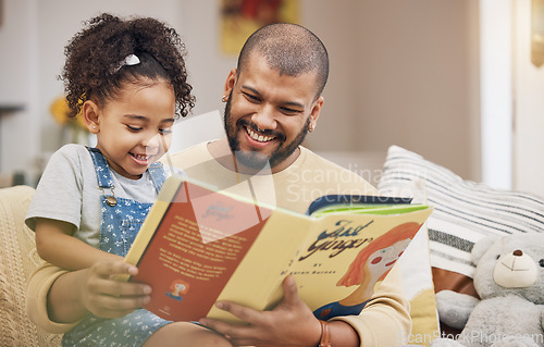 Image of Dad, girl and book on sofa with bonding, smile and love in storytelling in living room together. Happiness, father and daughter reading story on couch for fantasy, learning and education in home fun.