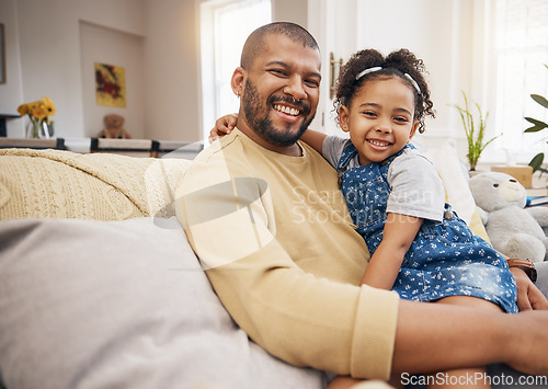 Image of Smile, portrait and girl with her father on a sofa in the living room relaxing and bonding together. Happy, love and child sitting with her young dad from Mexico in lounge of their modern family home