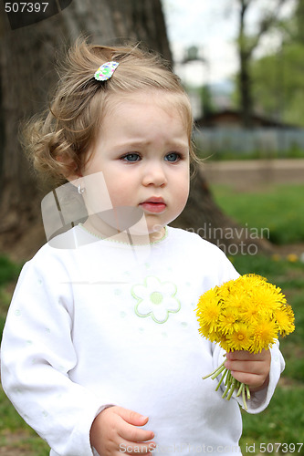 Image of pretty girl with flower