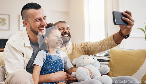 Image of Gay family, selfie and child on home sofa for video call, social media and internet. Lgbt men or parents with kid together on a couch for streaming, profile picture and adoption memory with happiness