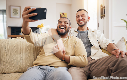 Image of Men, gay couple and funny selfie in home living room, bonding and laughing together. People, lgbtq and profile picture, happy memory and smile on social media in love, care and hug on sofa in lounge