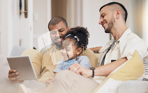 Image of Gay family, child and tablet on home sofa for e learning, communication and education on internet. Adoption, lgbt men or parents with a happy kid and technology for streaming movies, games or show
