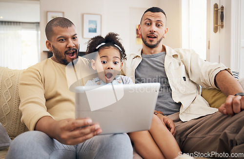 Image of Gay family, tablet surprise and child on home sofa for learning, communication and education on internet. Adoption, lgbt men or parents with kid and technology for streaming movies, game or wow video