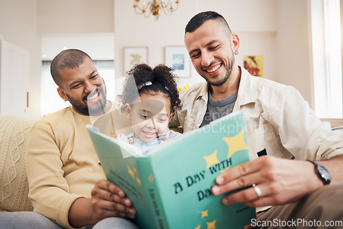 Image of Gay couple, kid and book on couch with smile, bonding and love in storytelling in living room together. Happiness, lgbt men and girl reading story on sofa for fantasy, learning and education in home.