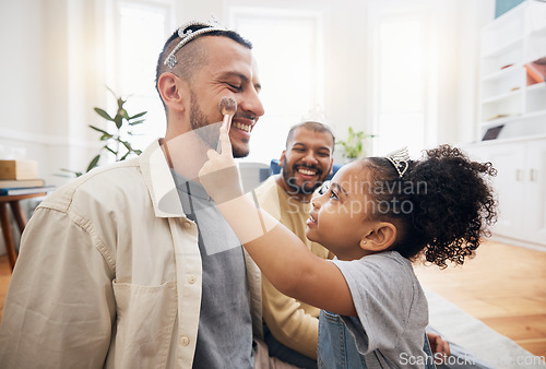 Image of Blended family, gay parents and makeup with a girl in the living room of her home for princess fantasy. LGBT, love or adoption and a daughter together with her father on the sofa for bonding closeup