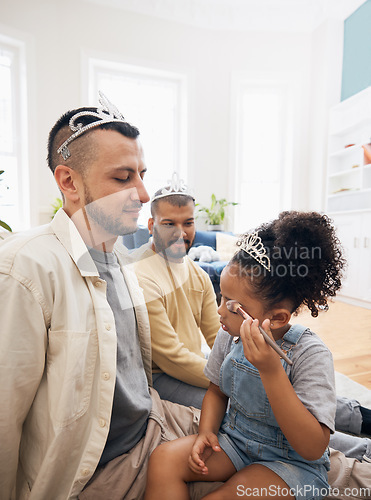 Image of Blended family, LGBT parents and makeup with a girl in the living room of her home for princess fantasy. Gay, love or adoption and a daughter together with her father on the sofa for bonding closeup