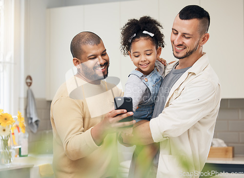 Image of Selfie, blended family and a girl with her gay parents in the kitchen together for a social media profile picture. Adoption photograph, smile or love and a daughter with her lgbt father in the home