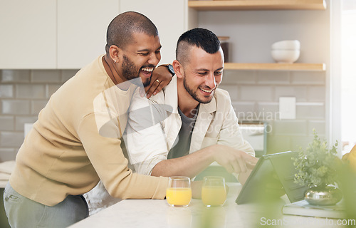 Image of Laughing, breakfast and a gay couple with a tablet in a kitchen for a funny video or social media. Happy, house and lgbt men with technology for communication or reading an online chat together