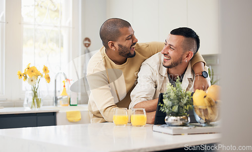 Image of Lgbtq, gay and couple hug in kitchen for bonding, happiness and relax together at home. Love, dating and men embrace, laughing and happy in apartment for funny conversation, talking and affection