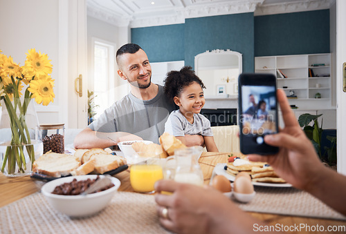 Image of Cellphone, lunch and picture of father, child or happy family for memory photo, bonding and care in brunch dining room. Phone, home photography or kid pose with dad, papa or man for social media post